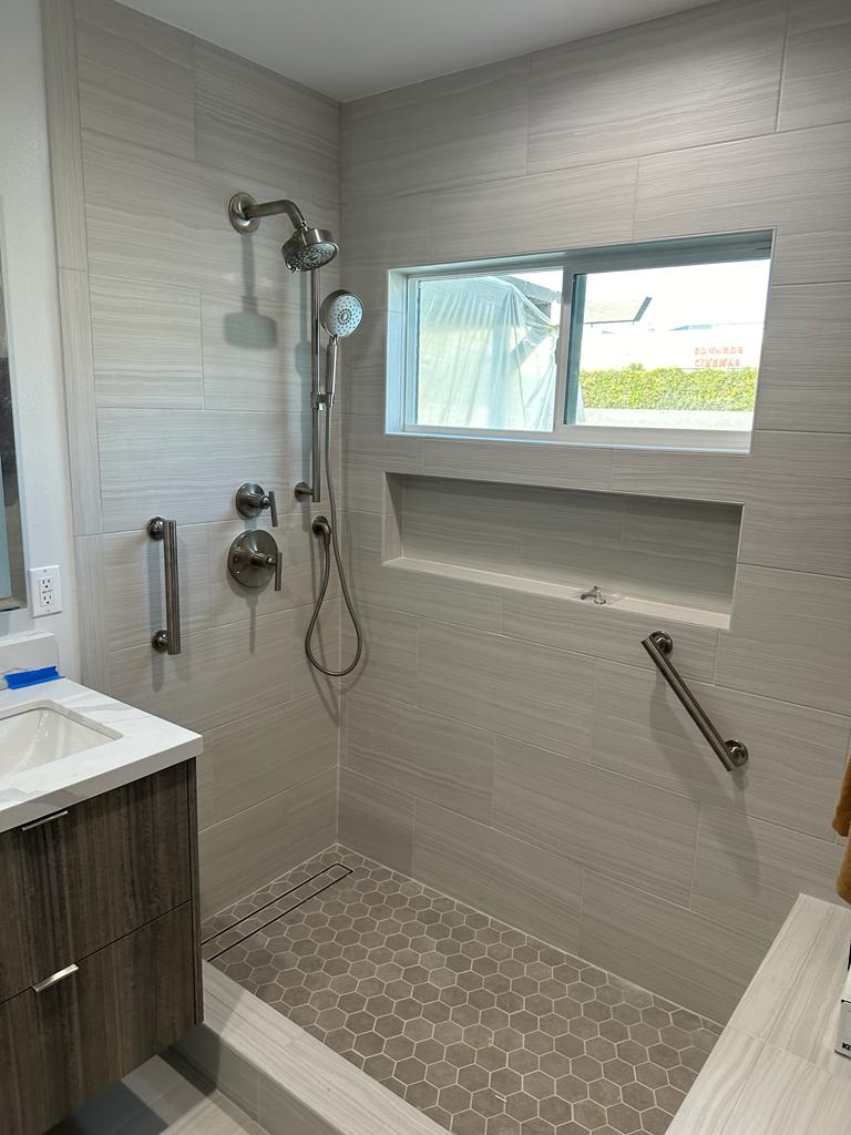 Modern tiled walk-in shower installed by SoCal Emergency Plumbing Newport Beach